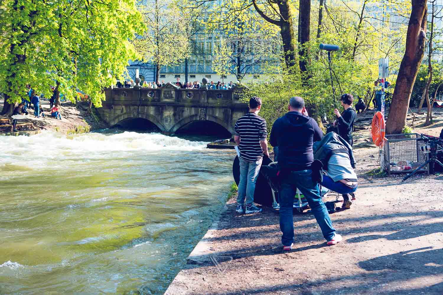 Eisbachwelle Munich - Surfing in the Eisbach - Canon advertising shoot - Surfing on the Eisbach Munich - Come and See - Canon commercial shoot - Tao, Karina, Alex - Samo Vidic - Campaign Fall 2016 - Autumn/Winter 16/17 - Surfing on the Eisbach, Munich, Prinzregentenstraße