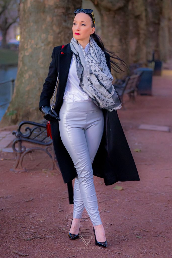 Vanessa Pur with silver leather pants as a fashion look for fall with silver leather pants and elegant long wool coat. Fall and silver leather pants instead of black for more