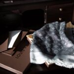 Louis Vuitton Monogram Denim Shawl black - 10 years of experience with the Louis Vuitton Monogram Denim Shawl black as an elegant winter shawl with LV logo and fringes. Luxury designer