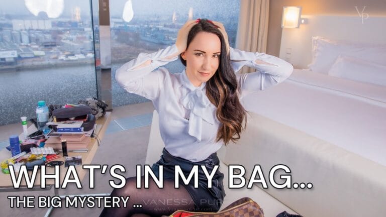 Elegant Business Woman in Black Tights with Louis Vuitton Speedy Handbag